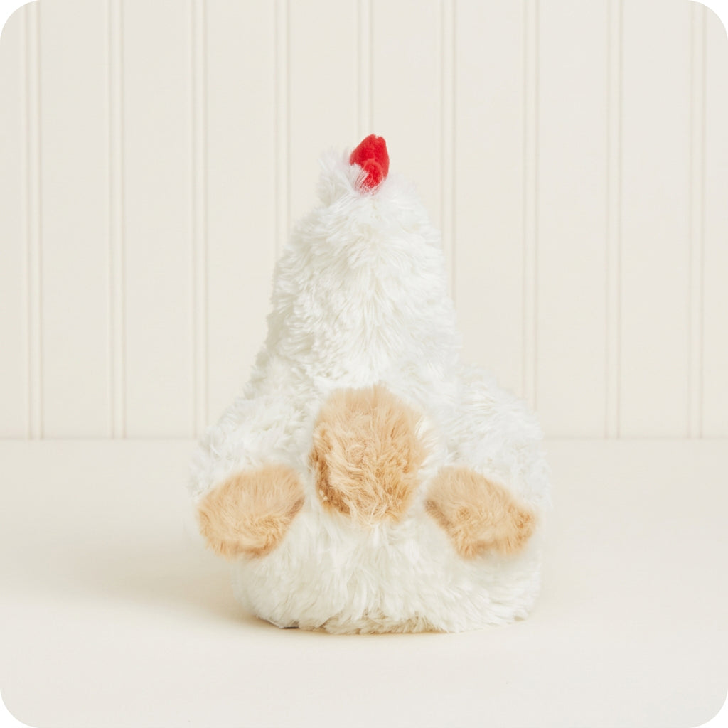 Plush toy resembling a chicken on a white background