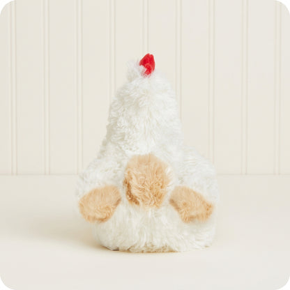 Plush toy resembling a chicken on a white background