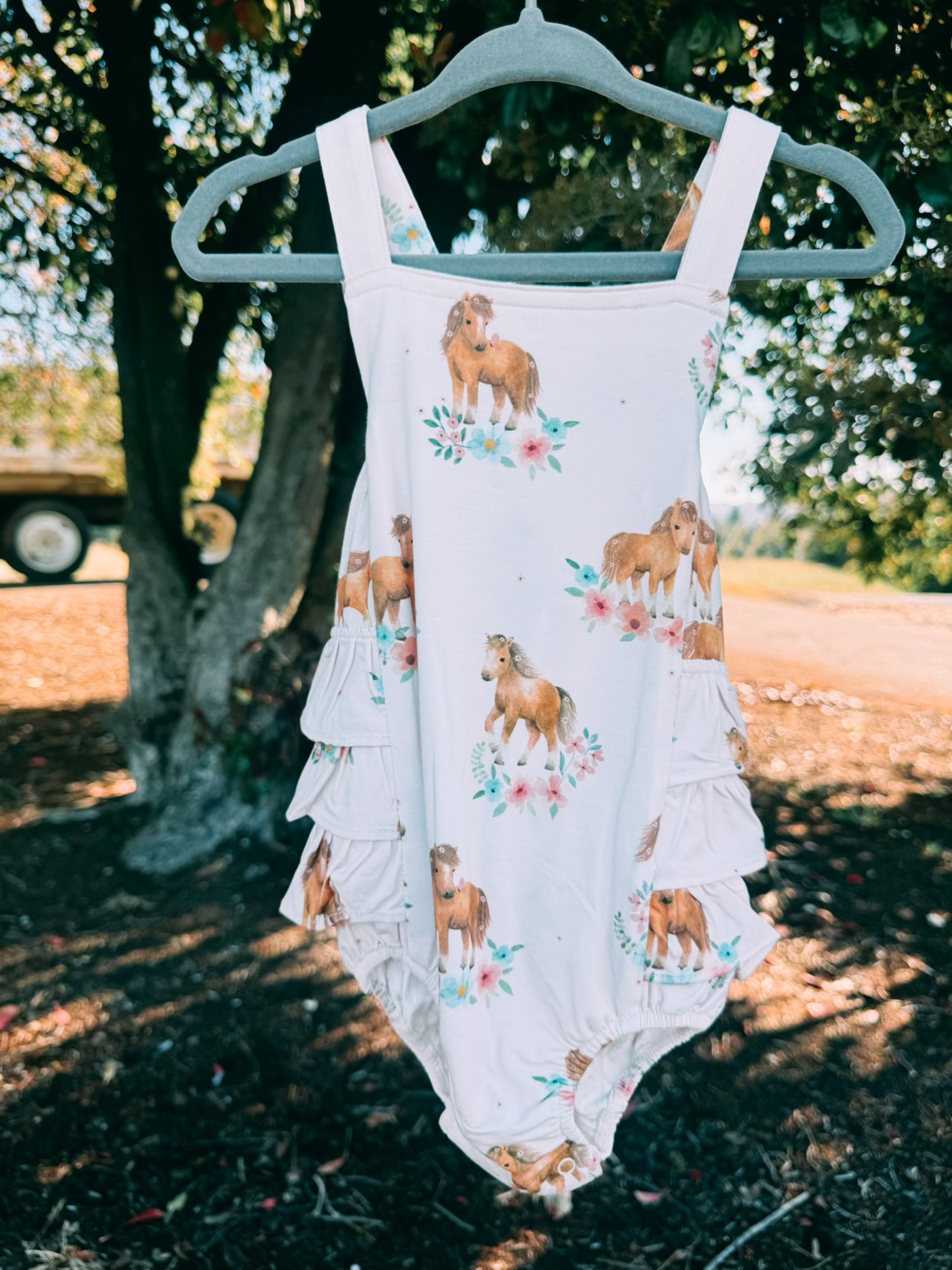 Pink Ponies Ruffle Sunsuit | Girls