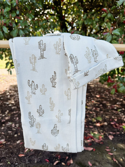 Light cream organic cotton fabric with brown cactus pattern with a batching infant beanie hat