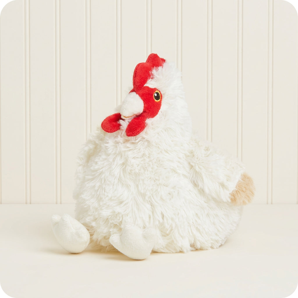 White plush rooster with a red comb on a light gray background