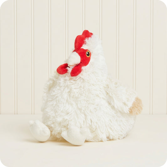 White plush rooster with a red comb on a light gray background